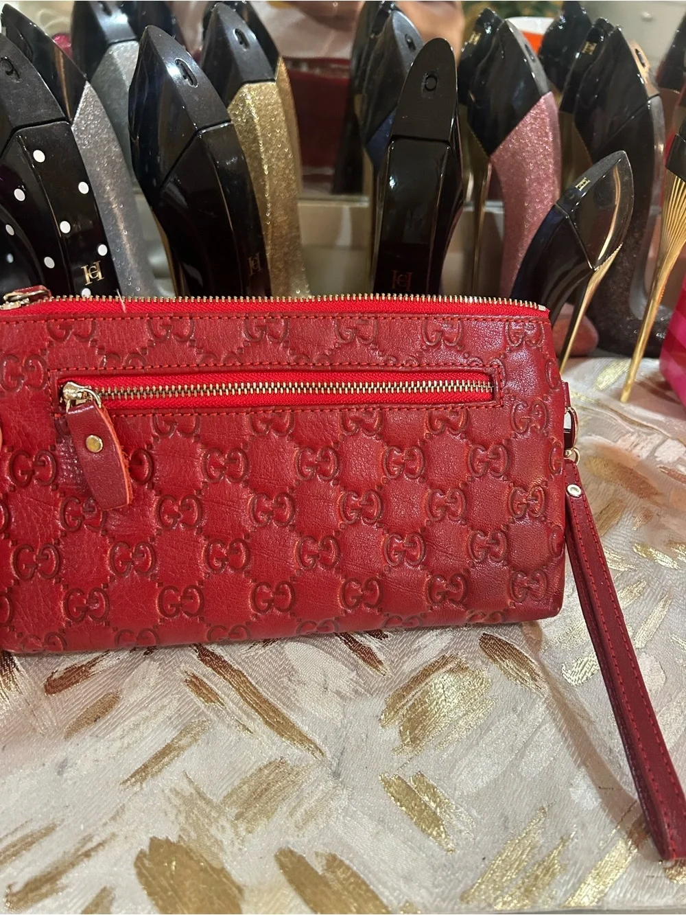 Vintage GG Red Embossed GG Leather Wristlet with Silver Chain Charm